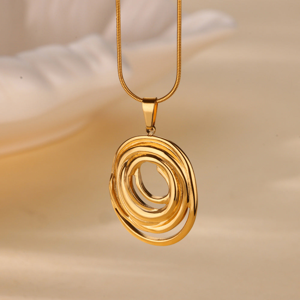 Fleur Swirl Pendant